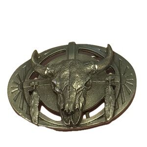 Vintage Diamond Cut Buffalo Skull With Feathers.